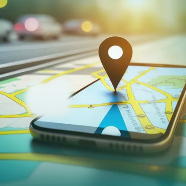 Smartphone displaying a digital map with a location pin symbolizing GPS tracking and real-time navigation.